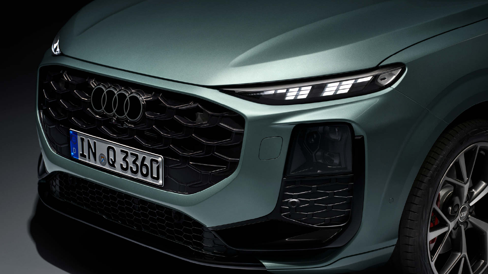 Three quarter view of an Audi A4 parked.